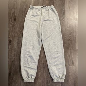 Grey lightweight sweatpants. Joah Brown and Alo inspired.